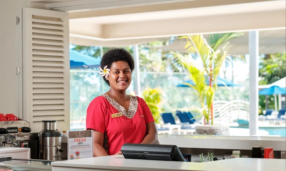 Fiji Gateway Hotel staff member smiles