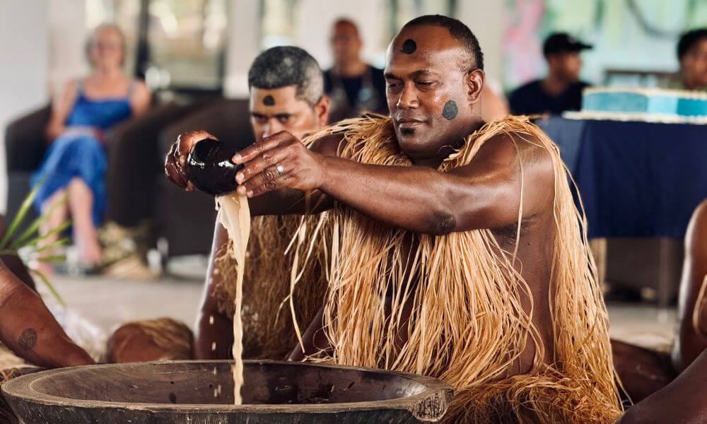 Fijian warrior prepares traditional kava